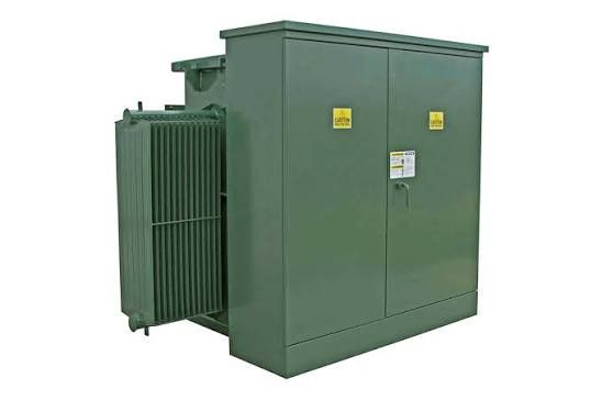 Pad-mounted transformer in green enclosure